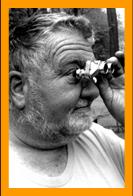 Man looking through binoculars