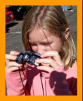 Girl with binoculars. 
Fille avec des jumelles.
Madchen mit fernglas.
Chica con binoculares.
Tjej med kikare.
Ragazza con il binocolo.
Meisje met verrekijker.
Jente med kikkert.
Dziewczyna z lornetka.
Divka s dalekohledem.
Pige med kikkert.
Lany tavcsovel.
Tytto kiikarilla.
Menina com binoculos.
Meitene ar binokli.
Mergaite su ziuronais.