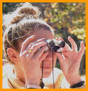 Woman Viewing with Miniature Binoculars