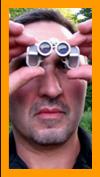 Man Viewing With Tiny Binoculars.
Man nusing binoculars.
Homme utilisant de jumelles.
Mann  mit fernglas.
Hombre usando binoculares.
Hombre usand prismaticos.
man som anvander kikare.
Uomo usa il binocolo.
Man met verrekijker.
Mezczyzna a lornetka.
Muz s dalekohled.
Mand med kikkert.
Tavcsovel rendelkezo ferfi.
Mies jolla on kiikarit.
Mulher com binoculos.
Virietis ar binokli.
Vyras su ziuronu.
6x15 binoculars.
7x18 binoculars.