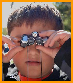 Child Using Miniature binoculars